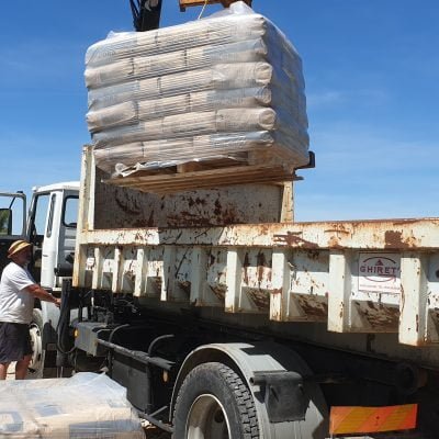 Unloading a pallet of cement